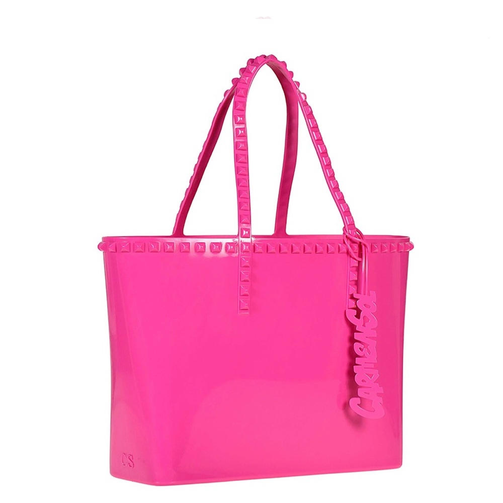 Carmen Sol. Med size. Jelly bag  in fucsia color.